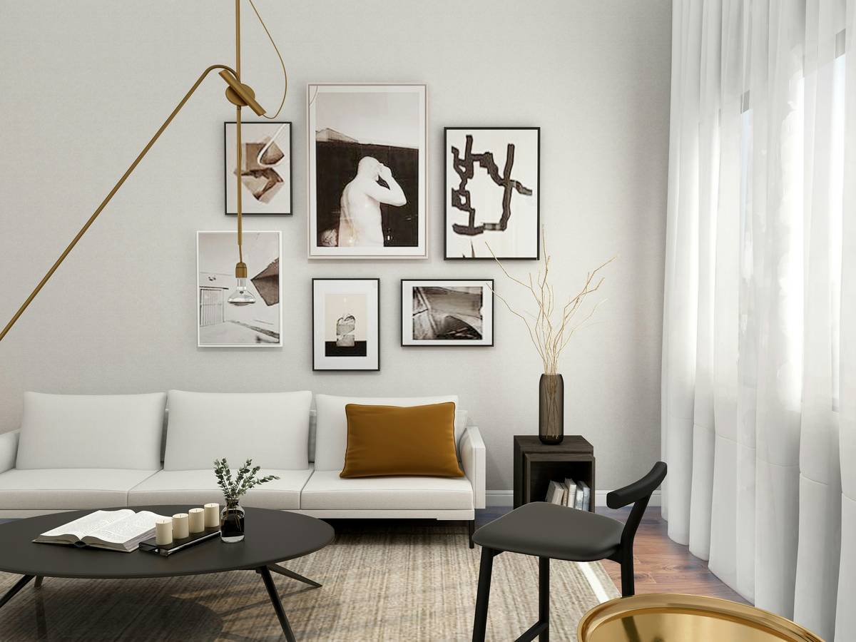 wall clock home decor ideas featuring a vintage brass clock centered above a neutral-toned console table